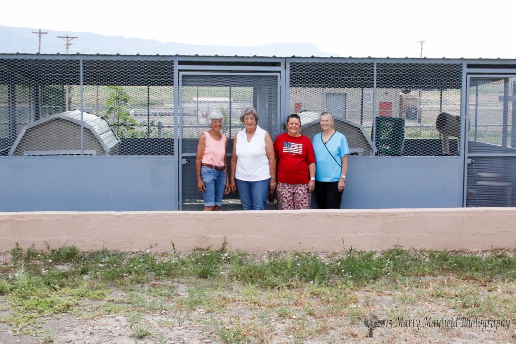 Raton Humane Society President Barbara Bonahoom with her sister and Diane Bonahoom, Vice President Jeannie Poulter, and Board member Sara Evans. These shelters were built as a result of a need to house animals during a time of tragedy like the Track Fire. 