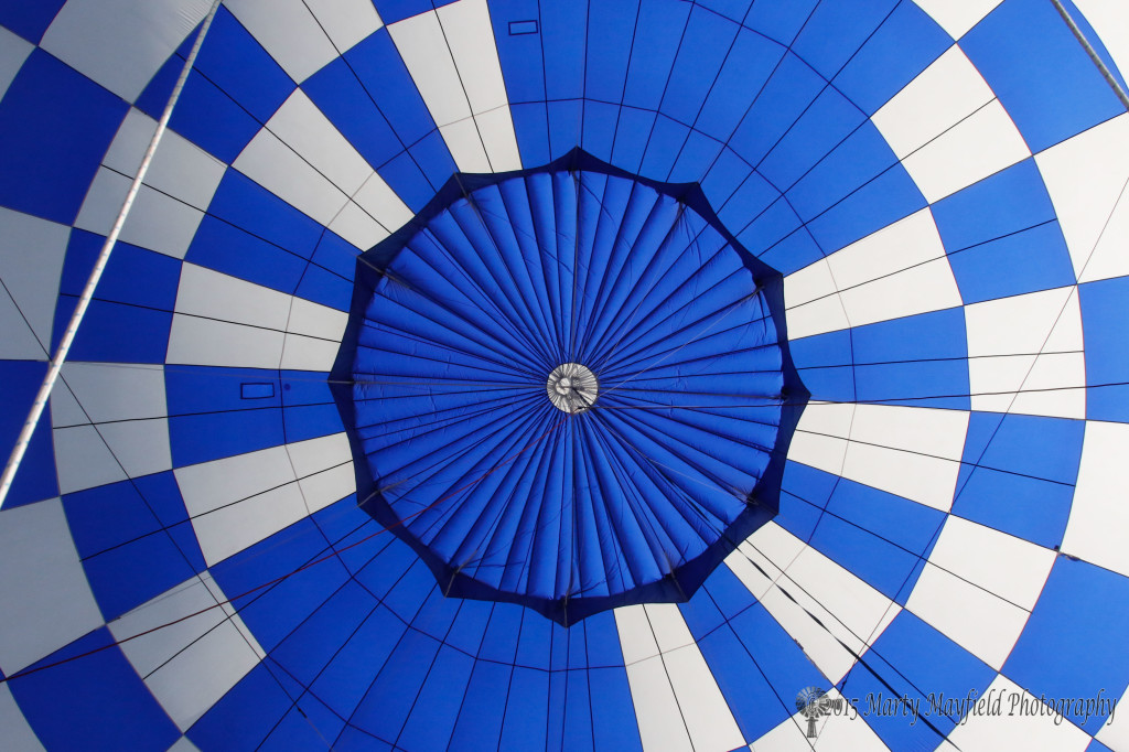Color galore as the camera looks up and in the "Any Way the Wind Blows" Balloon