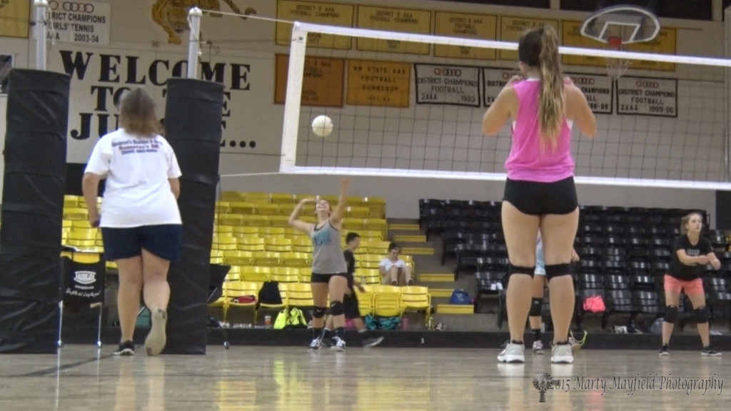 Returning Juniors Sophia Madelini and Camryn Stoeker are doing warmup drills during practice. 