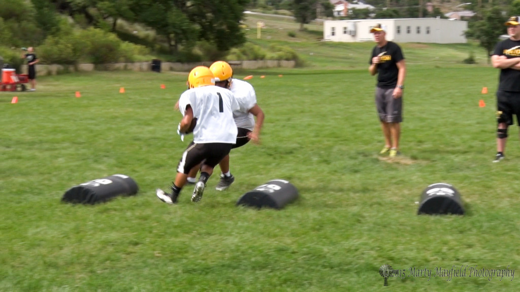 RHS Football players are working on tackling drills during practice Monday afternoon.
