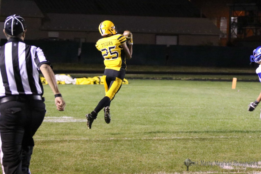 Jonathan Cabriales makes another great catch to set Raton up for another score Friday night during the Homecoming game with Questa.