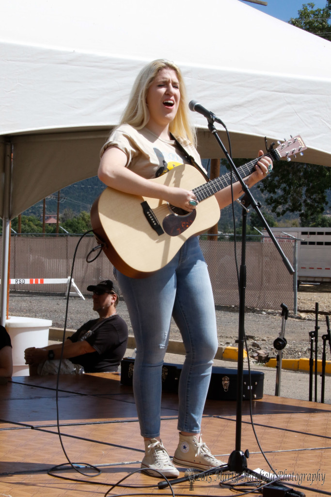Marilyn Moser sang one of her songs Saturday as winner of the Singer Songwriters competition.
