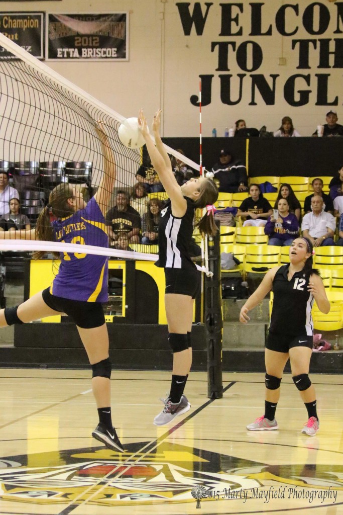 Montana Martinez goes to the net for the block but the ball falls into the net and down for the Tucumcari point by Alexis Nolan