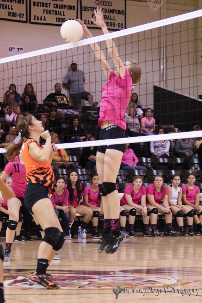 Its Alina Pillmore at the net as she gets the block Saturday afternoon.