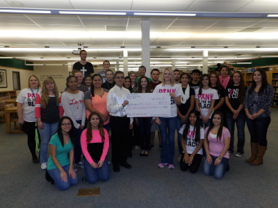 Raton High School National Honor Society Chapter President Juan Prieto-Archuleta and fellow NHS members were honored to present a check in the amount of $475.00 to the Raton High School FCCLA President Ivy Fernandez.