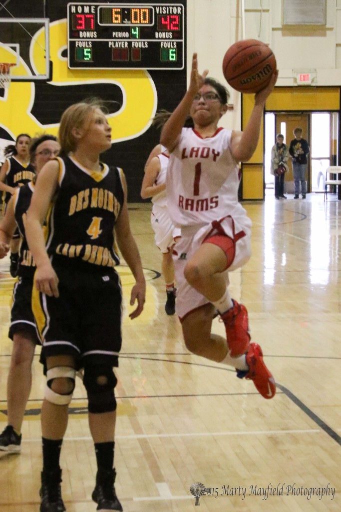 Its another lay-up by Angel Gonzales as the Lady Rams try to take the lead in the consolation game at the 2015 Cowbell in Raton Saturday 