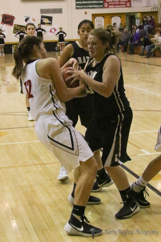 Jadyn Walton and Katy Scott(32) struggle for the ball in the Championship game of the 2015 Cowbell Monday night