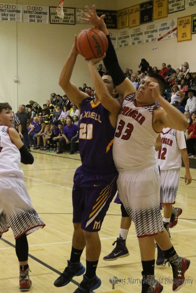 Zach Sanchez comes in from behind to get the block and the foul as Devon Cruz takes the short jumper Monday evening