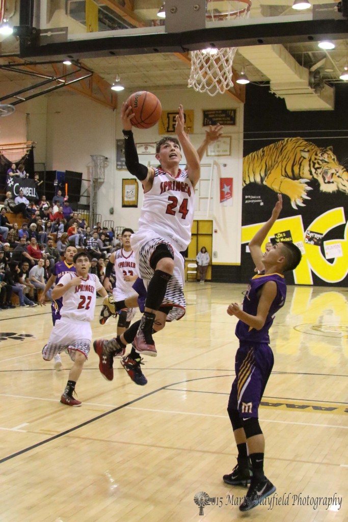 Isaiah Garcia flies high as Jeremy Archuleta follows right behind him working for the block during the 2015 Cowbell