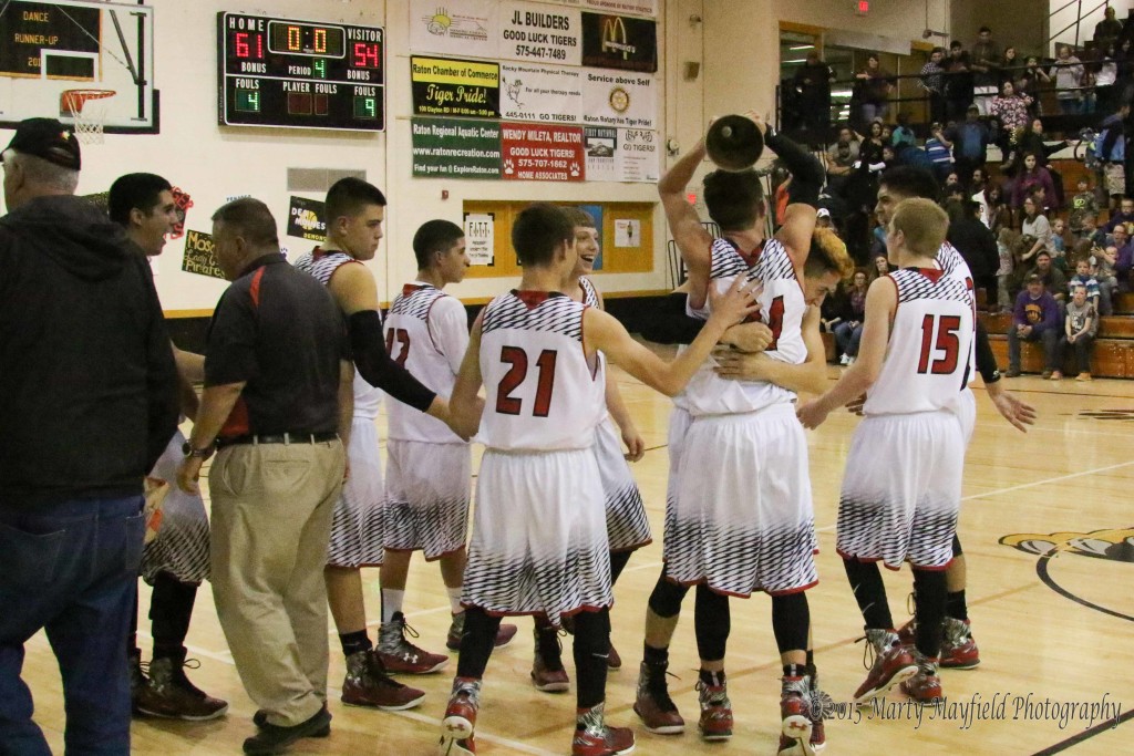 The bell rings as the boys celebrate their win over the Maxwell Bears who gave the Red Devils one heck of a ball game.