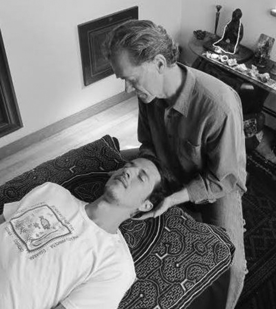 John Davidson works here with a participant demonstrating how Soul Coaching works. Photo by Colette M. Armijo.