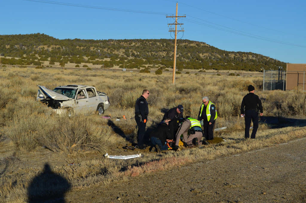 An Amber Alert was issued early Tuesday morning for the White Cadillac Escalade seen in this photo that crashed south of Walsenburg Tuesday morning. Photo by Brian Orr