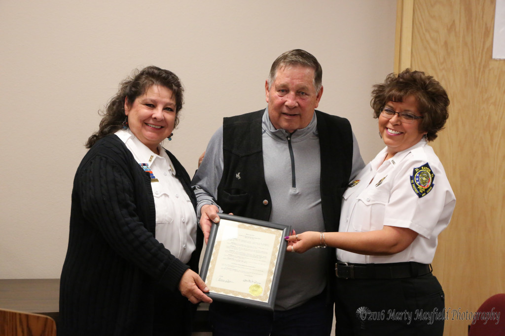 Supervisor Carol Baca and Dispatcher Valerie Monica accepted the Proclamation for National Tele-Communicators Week from Commissioner Ron Chavez. Not pictured are dispatchers: Apryll Lopez, Amy Pilsner, Stevi Salazar and Christine Blocker