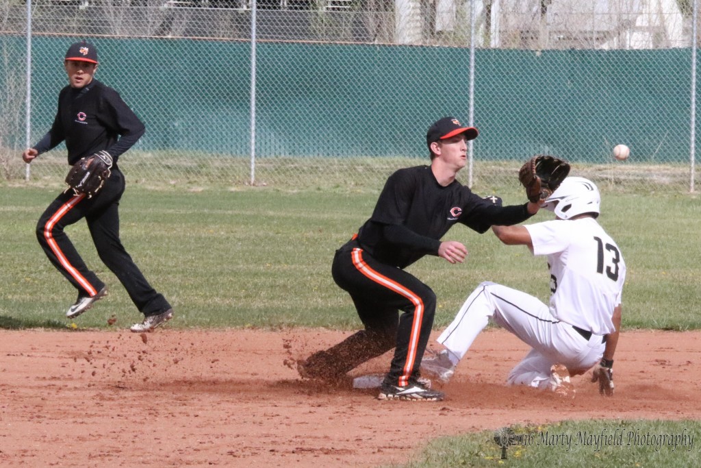 Jonathan Cabrieles just beats the ball to second as he slides in during game one of a double header with Clayton 
