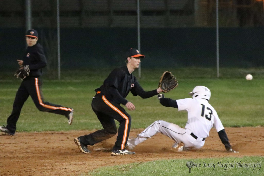 Jonathan Cabrieles makes it to second as he beats the ball to Carson Vandiver at Second.