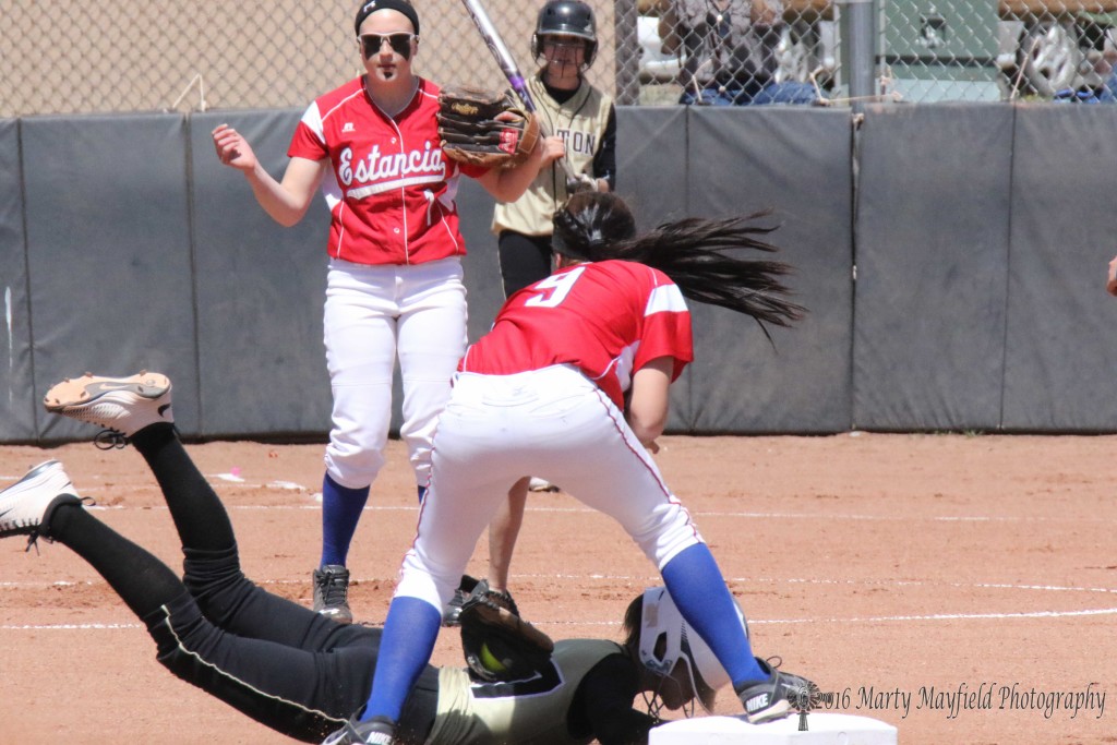 Camryn Mileta just steals second as Nicole Barela reaches for the tag
