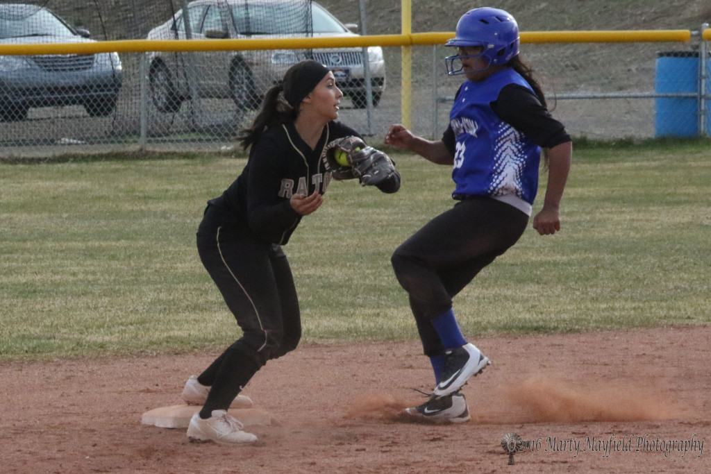 Sophia Madellini makes the force out at second and looks to make the throw to first for a double play but the ball arrives a split second to late and the runner is safe at first