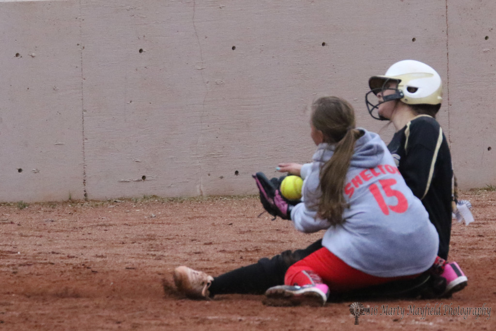 Its the final play of game two as Camryn Stoecker slides into home plate as pitcher Izabella Kuntz goes for the tag, Raton ended the game in three innings with this run 15-0 