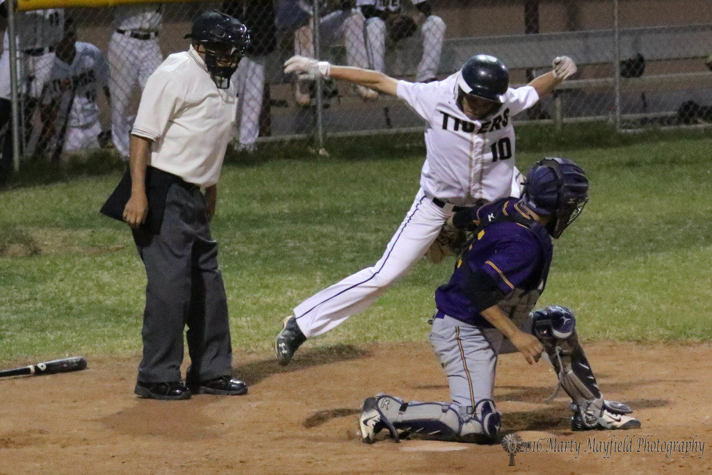 The graceful Damien Martinez gets tagged as he tries to make it to home plate in the second game of the double header with Tucumcari