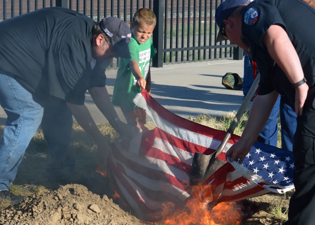 Proper retirement of a US Flag is by burning according to the US Flag Code, Title 4, Chapter 1, Section 8(k) Photo by Bob Wick