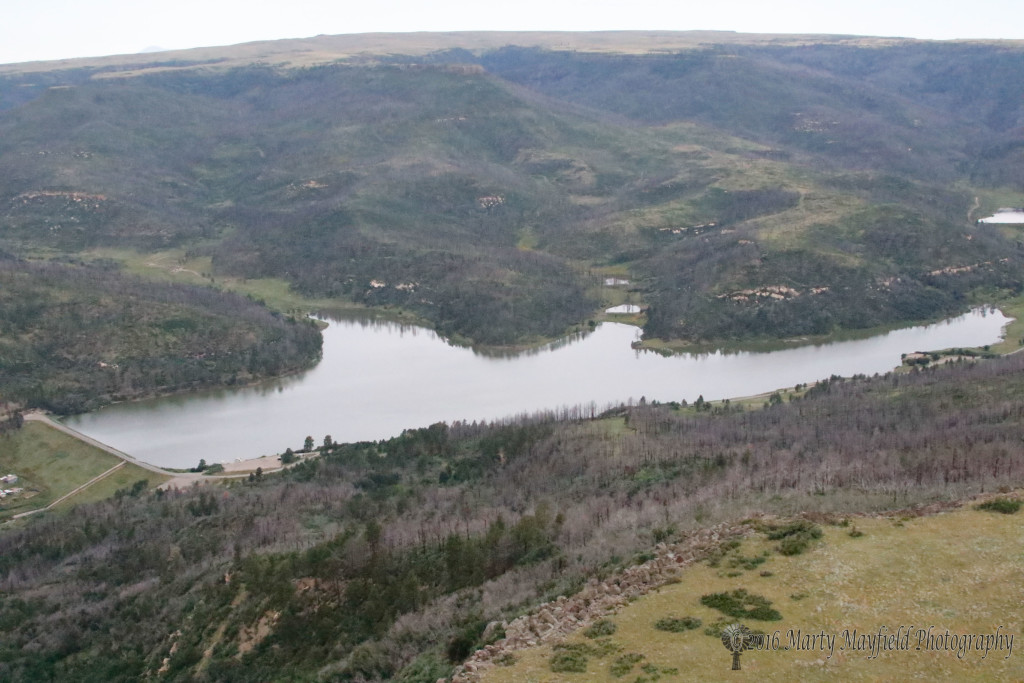 The hills around Lake Maloya are once again green four years after the fire.