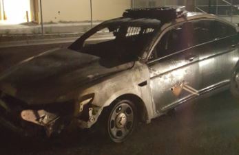 State Police vehicle burns after being struck while jump starting another vehicle