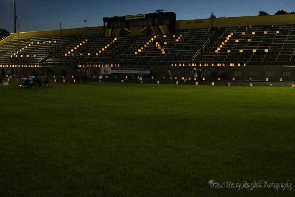 Cure glows on the stadium bleachers at the 2016 Relay for Life Saturday night