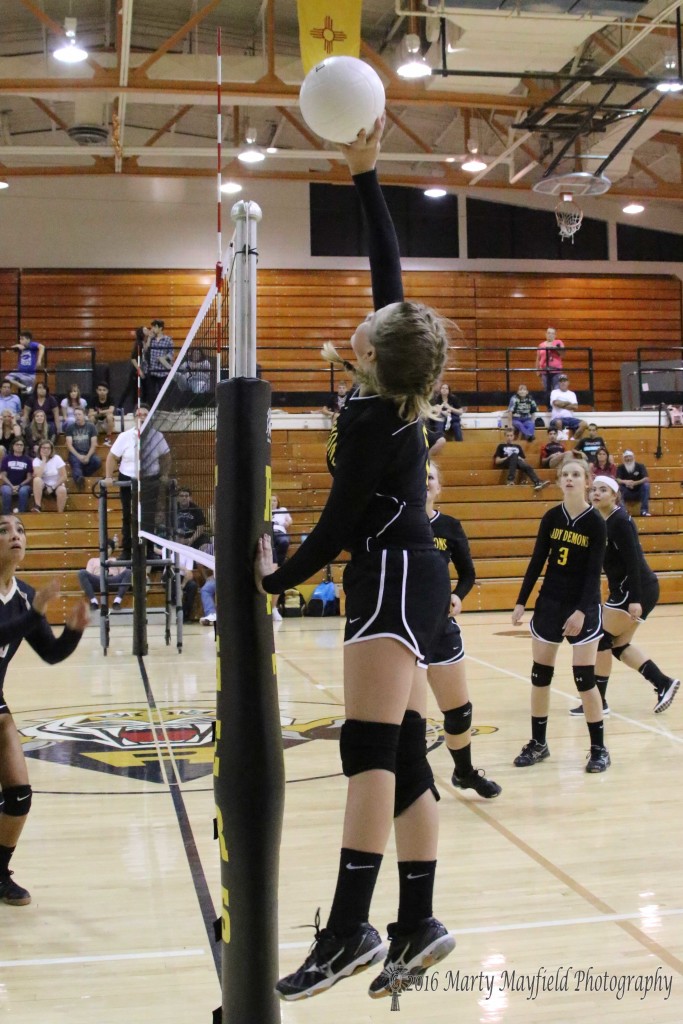 Tasha McDonald goes for the hit but finds herself just a bit wide as the ball goes outside the antenna denoting the out of bounds line Thursday evening during the RHS Tourney