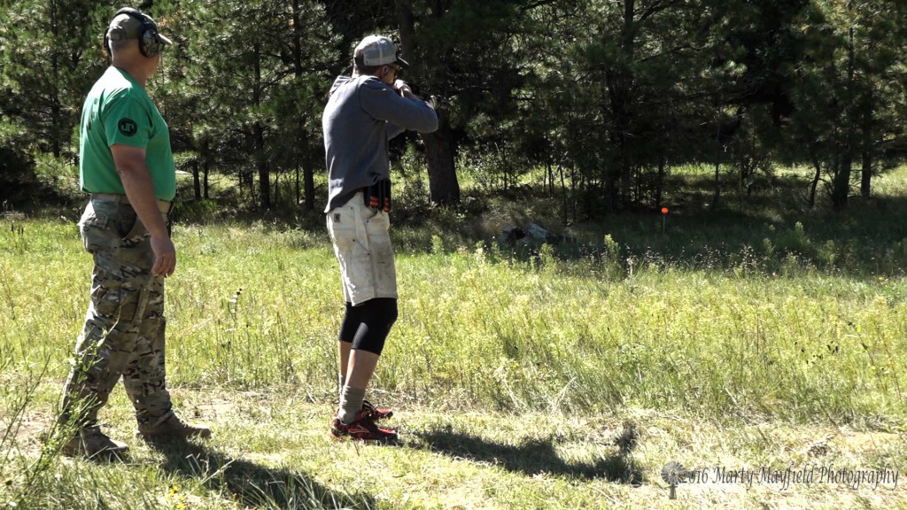 Raton's own Ted Kamp takes aim at the clay pigeon on the target down range during the 2016 Master of the Mountain Adventure Race