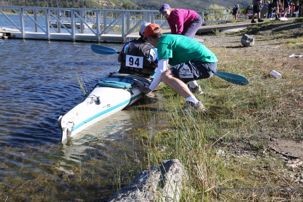 Ted Kamp from Raton was one of the individual competitors at the 2016 Master of the Mountain Adventure Race, here he is helped into the water by his wife Tracy Kamp and Sean Lerch Photo by Holly Kohler