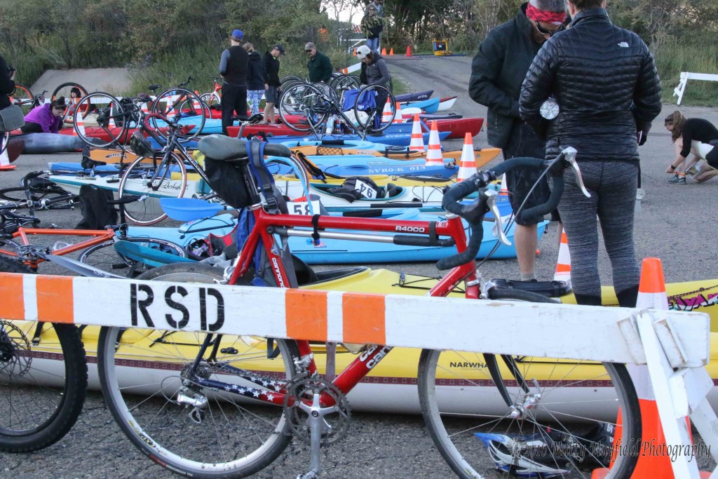 Bikes and Kayaks fill the Lake Maloya boat parking lot as 2016 Master of the Mountain Adventure Race participants prepare for the days race Saturday morning 