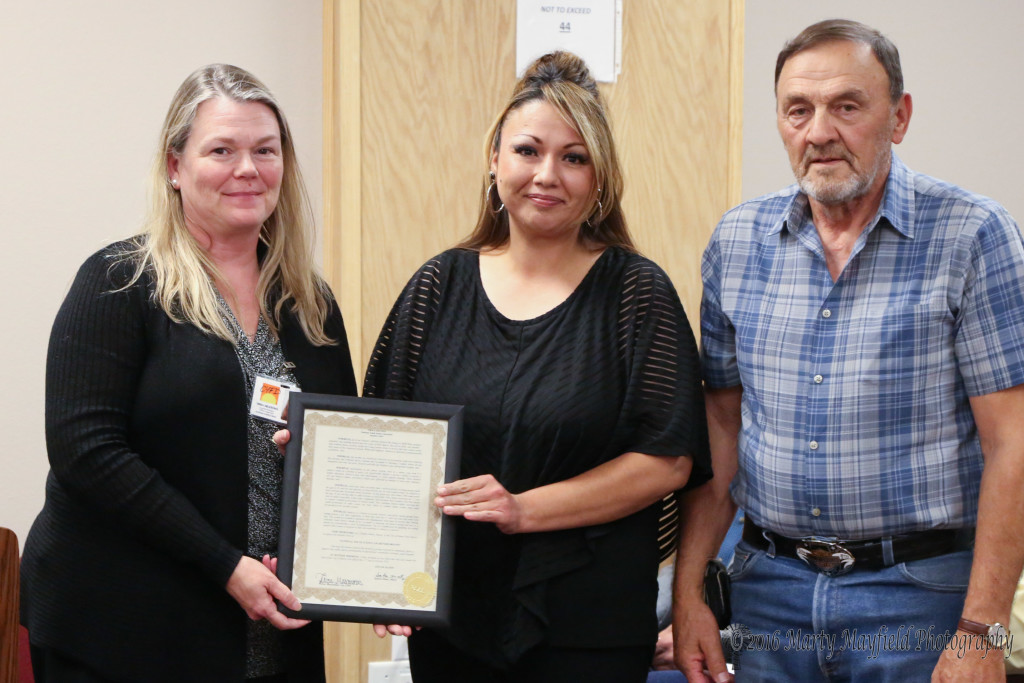 Erika Meadows and Danielle Esparza accepted the proclamation from Commissioner Don Giacomo for the Youth Justice Awareness Month 