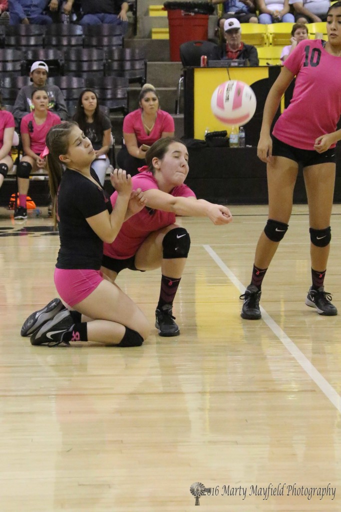 Its a close one as Montana Trujillo and Halle Medina meet on the floor going for the set. 