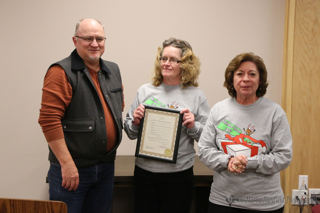 Mayor Pro-Tem Neal Segotta presented the proclamation recognizing the efforts of the Reindeer Dash to Jami Esquivel and Sally Chavez. The Reindeer Dash collects monies to help with kids Christmas.