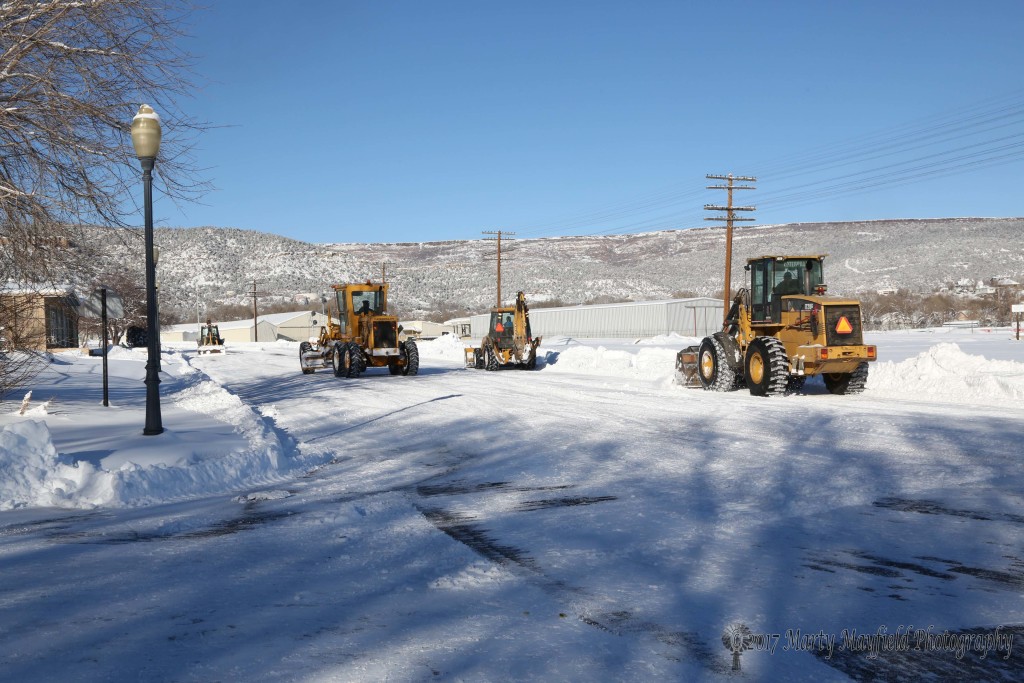 City crews team up to clear First Street late Friday afternoon 