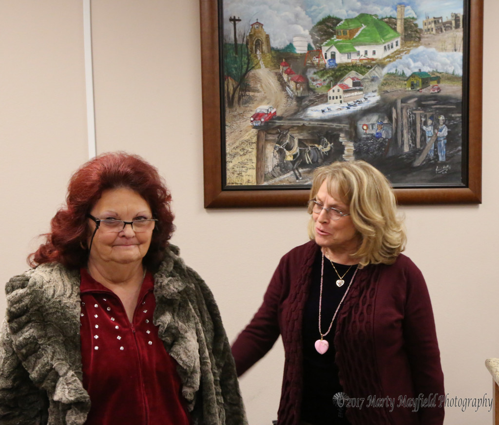 Jeannie Poulter was recognized by commissioners for her painting that now hangs in the commission chambers 