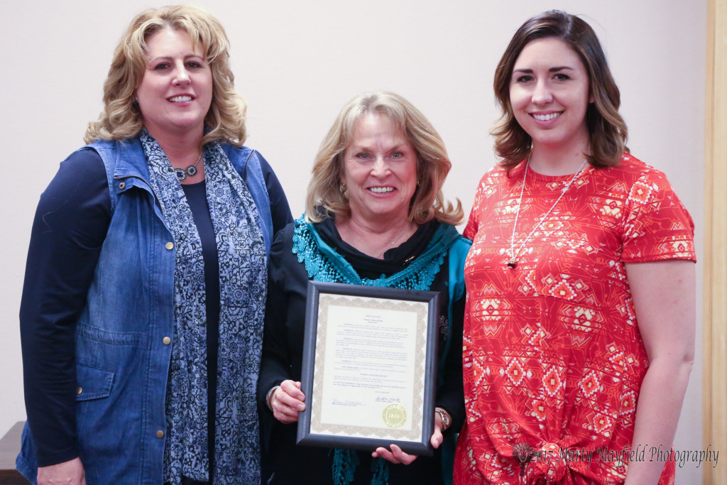 Michael Anne Antonucci and Tarin Giacomo accepted the proclamation for Women's History Month from Commissioner Lindé Schuster Tuesday evening at the city commission meeting. 