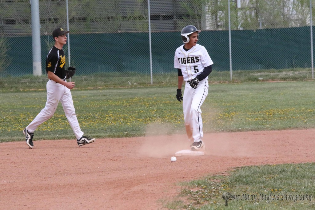 Mateous Samora makes the steal to second during the district makeup game with Tierra Encantada Monday afternoon.