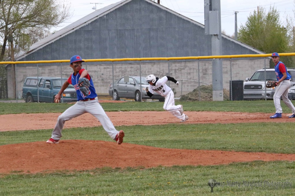 Trevor Portillos takes off for second base and makes the steal against McCurdy as AJ Vallo starts his windup Saturday afternoon.