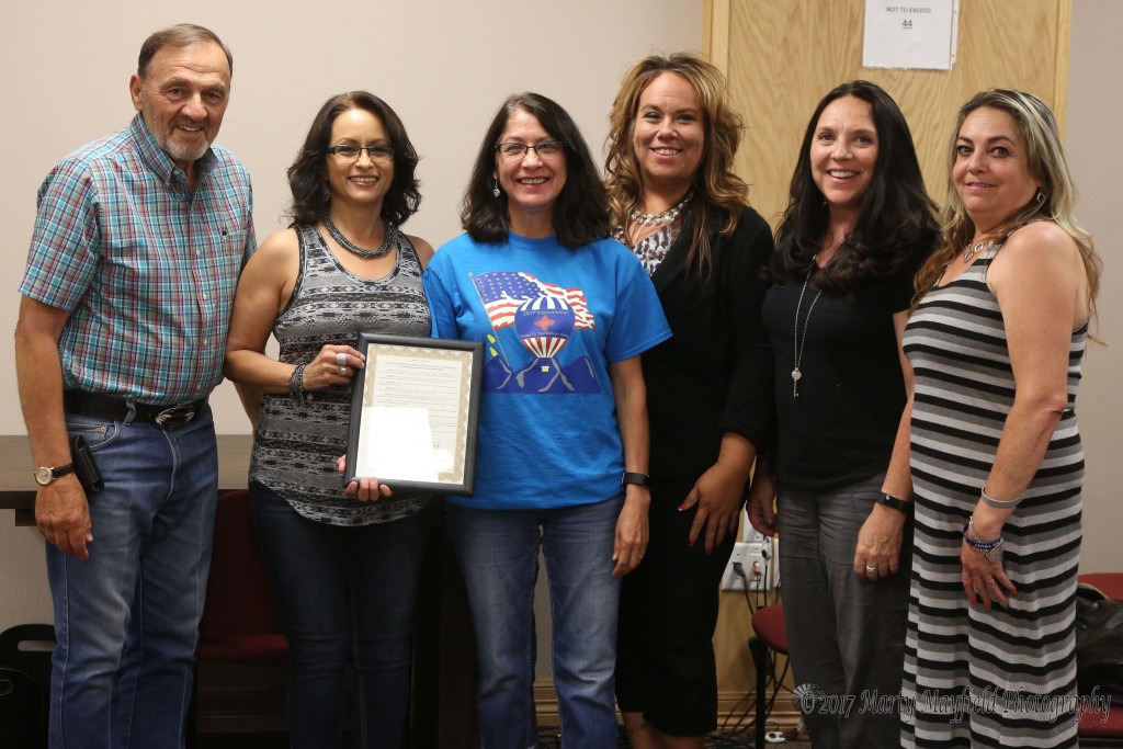 Raton MainStreet's Sandy Langon, Christine Valentini, Jonni Valdez, Brenda Ferri and Tricia Romero accept the Proclamation for the 4th of July activities and Balloon Rally from Commissioner Don Giacomo
