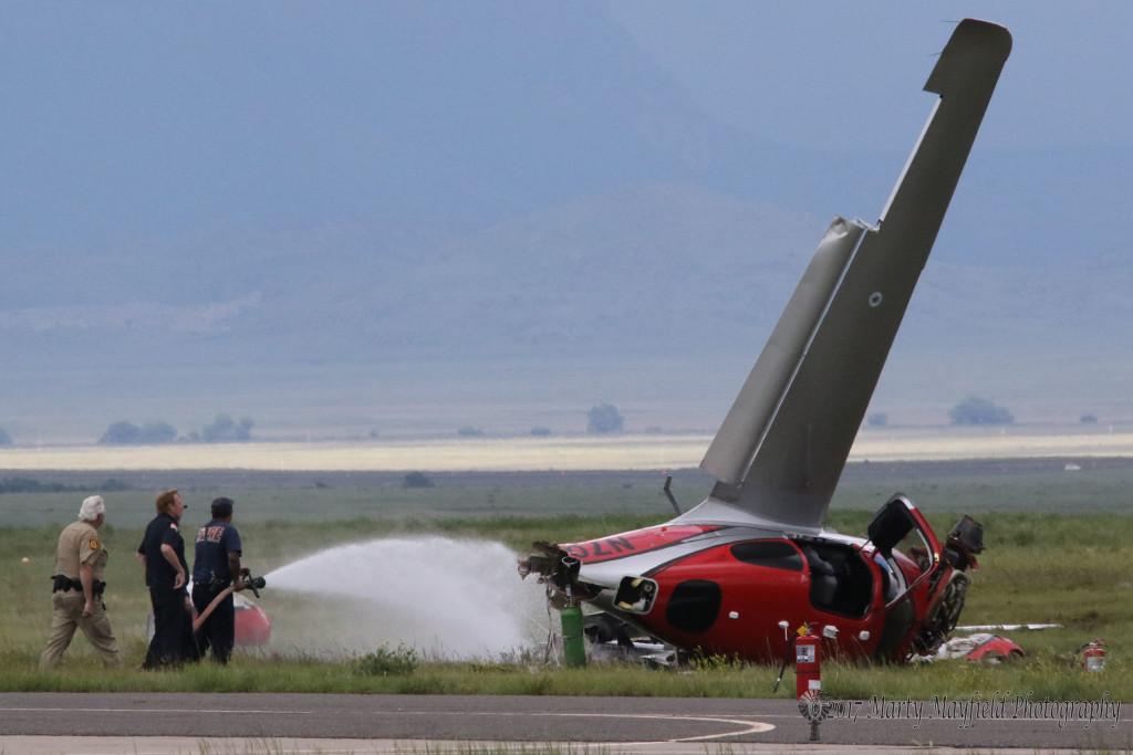 Raton Fire Fighters doused fuel that leaked from this airplane after it crashed on landing at Raton Crews Field Airport shortly after 4:00 p.m Thursday.