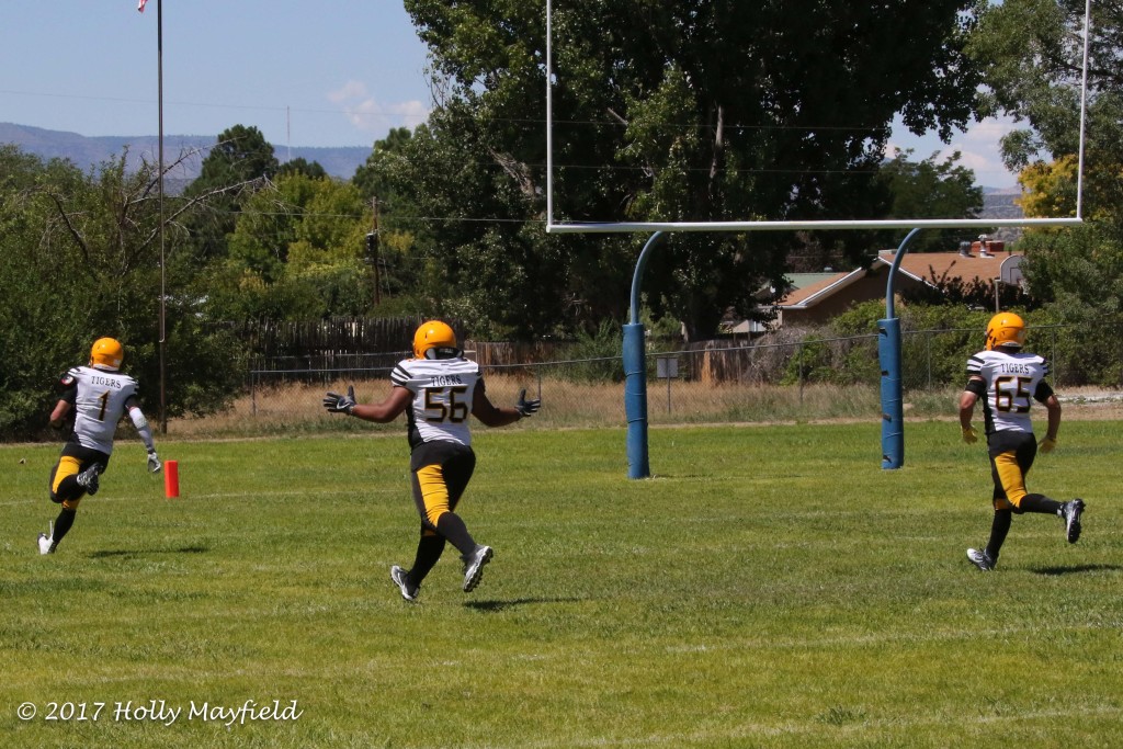 Nathaniel Tarbox all alone crosses the goal line for a Raton TD during the game with McCurdy in Espanola Saturday afternoon.