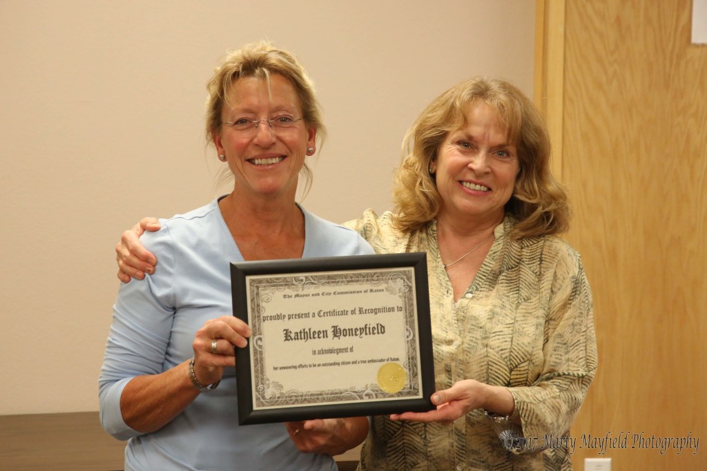 Kathy Honeyfield was presented the You Rock Award for her efforts around town by Commissioner Lindé Schuster Tuesday evening. 