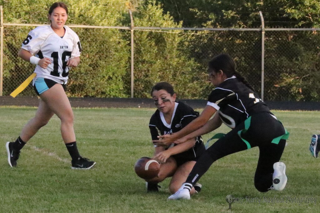 Srs Natausha Ortega and Autumn Archuleta go for the pass that ends up falling incomplete during the powder puff football game Wednesday evening.