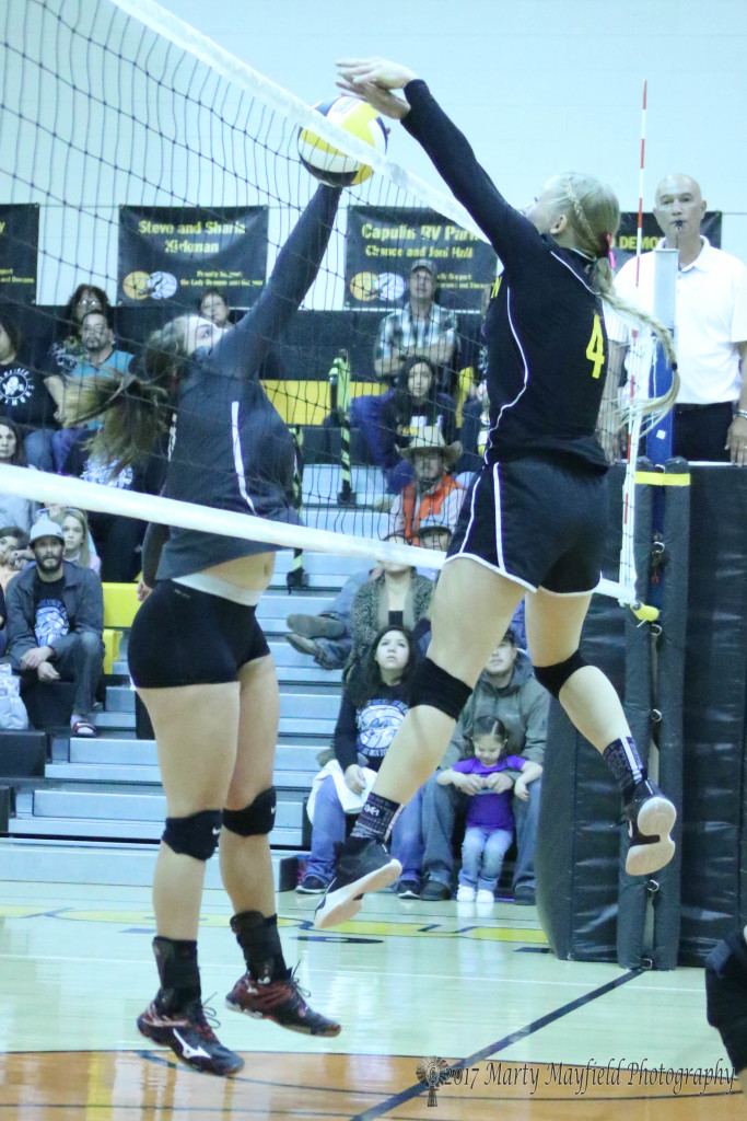 McKenna Hittson won this volley as she slams the ball right back down after Katy Scott tips it over the net. 