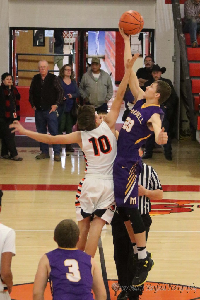 Maxwell's big weapon on the court is Kolten Riggs, a 6 foot plus sophomore, who easily out jumps Ethan Lawerence on the on the opening jump ball to give Maxwell the first chance at a score. 
