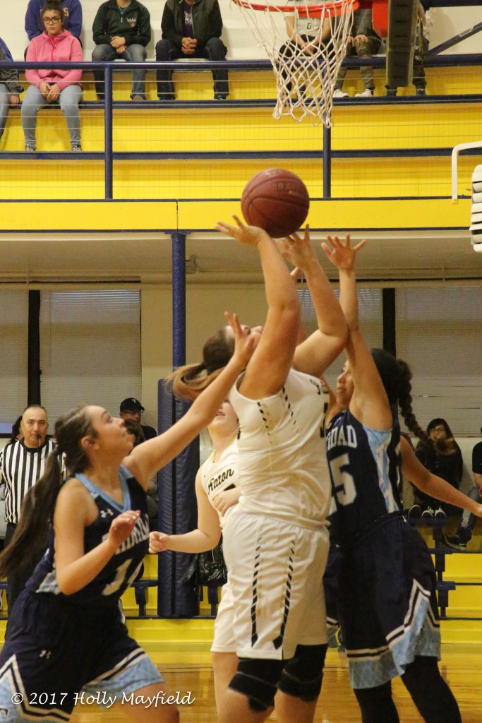 Sydni Silva goes up for the shot as Jasmine Abeyta goes for the block during the TSJC Tourney Saturday evening in Scott Gym. 