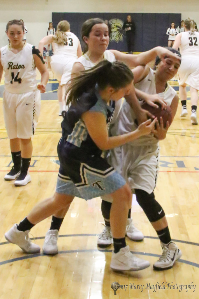 Natausha Ortega and Jamielynn Vellejos battle over the ball as Baylor Walton gets in the mix Saturday evening during the 2017 TSJC Tourney held in Scott Gym.