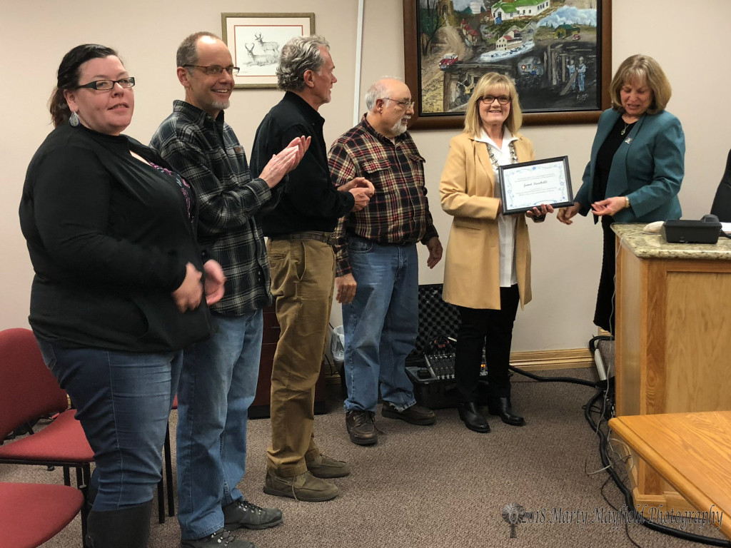The You Rock Award was presented to Janet Icobelli for her work at the Regional Education Foundation. L to R Jessica Barfield, Geoff Peterson, John Davidson, Ron Icobelli and Janet Icobelli with Commissioner Linde Schuster. 
