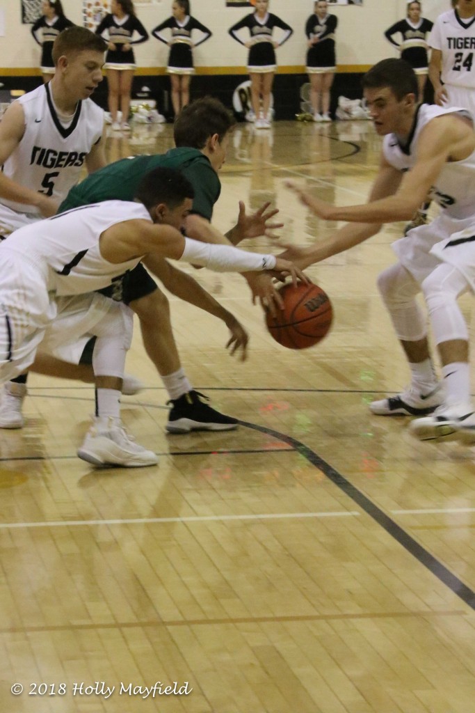 The ball gets loose and its a scramble to gain control of that loose ball during the TigerFest 2018 ball game in Tiger Gym Saturday e evening.